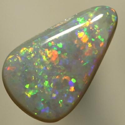 SOLID SEMI BLACK OPAL Sparkles of red, orange, green and blue